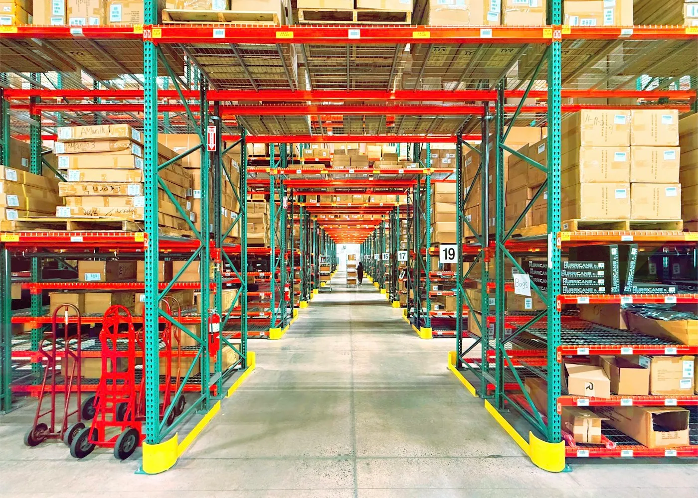 Distribution warehouse with pallet racking and inventory staged for shipment